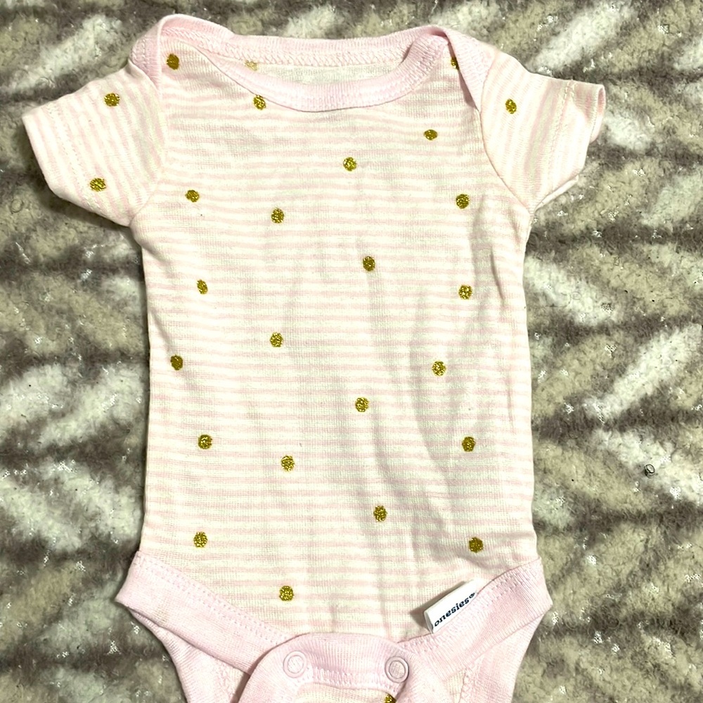Never Worn. Fits a preemie baby.